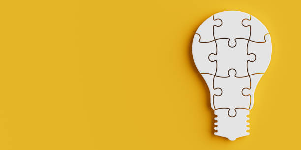 istock Idea, Creativity and Problem Solving Concept.  White Puzzle Pieces Arranged in the Shape of a Light Bulb. 3d Rendering 2181289589