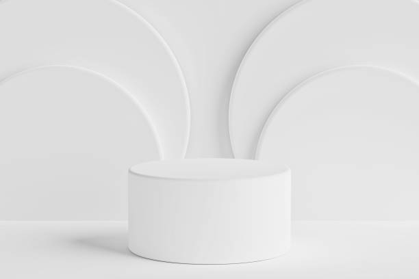 istock White Minimalist Cylindrical Product Display Platform in front of a Overlapping Semicircles Creating an Abstract Pattern. 3d Rendering 2181289630