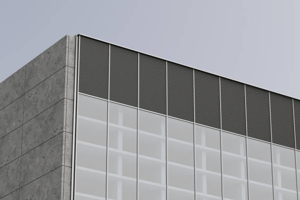 istock Modern Building Facade with a Gray Concrete Wall and a Large Window Section Mockup. 3d Rendering 2181290154