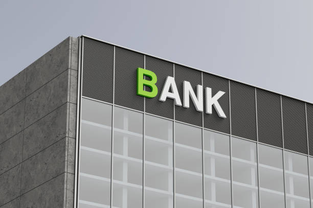 istock Modern Building Facade with a Gray Concrete Wall, Large Window Section and Bank Sign. 3d Rendering 2181290274