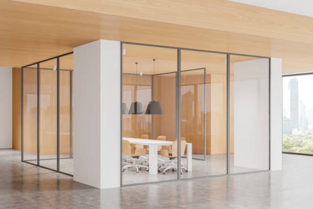 istock Wooden office room interior with meeting table and chairs, panoramic window 2181290745
