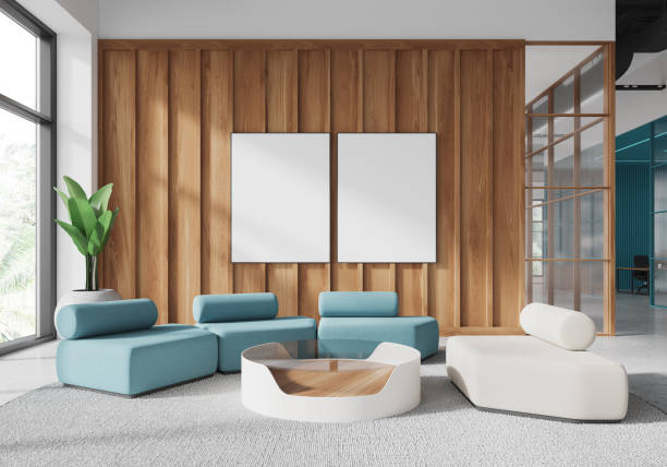 istock Modern lounge area with blank posters and wooden wall. 3D Rendering 2181290776