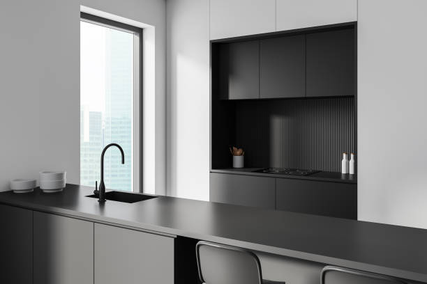 istock Luxury home kitchen interior with bar island, cabinet and panoramic window 2181290932