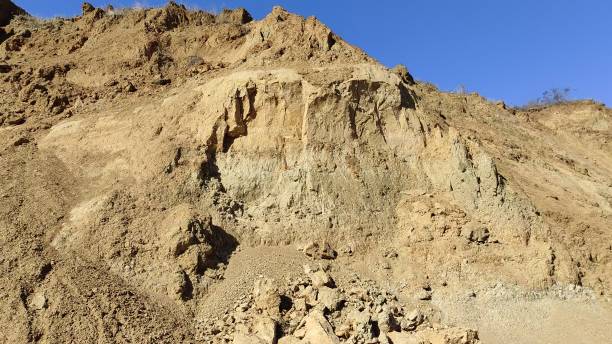 istock Sandstone mountains with plants against blue sky 2181299470