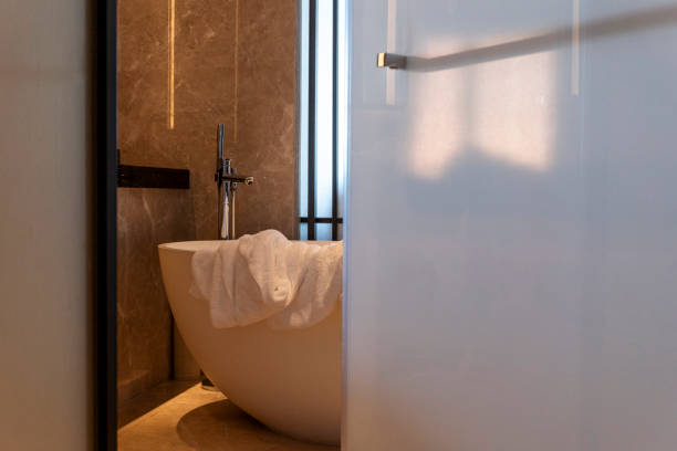 istock Bath towels and bathtub 2181300433