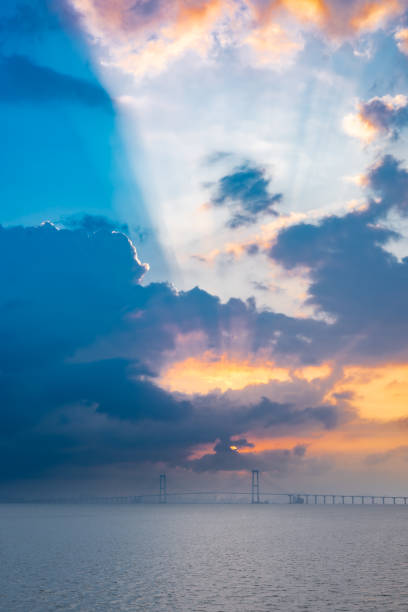 istock Cross-sea bridge at sunrise with beautiful clouds at vertical composition 2181306556