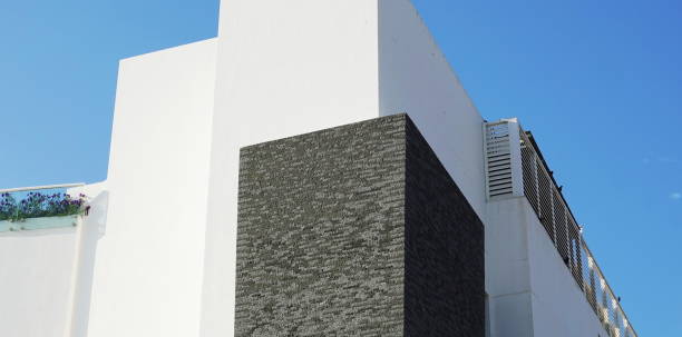 istock Modern Building Closeup Horizontal White And Gray Architectural Exterior Background 2181307573