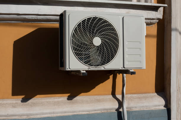istock External air conditioner unit on building wall, close up 2181311201