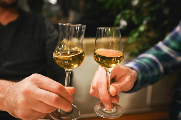 istock Friends drinking grappa close up in a restaurant. Brandy and Glass 2181314574