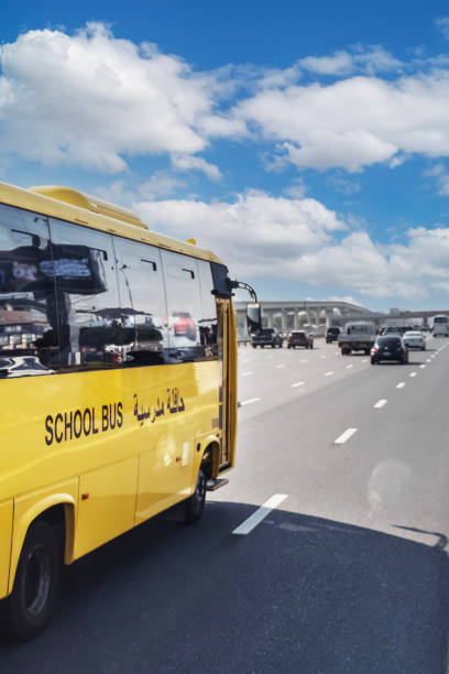 istock Dubai school bus, yellow arabic school bus. vertical 2181314857