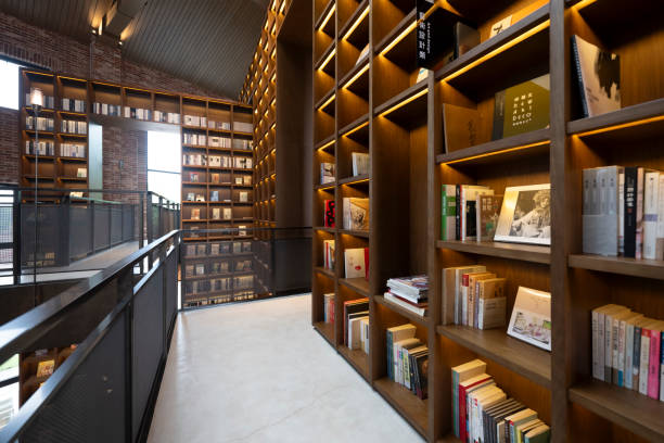 istock A modern library with rows of wooden bookshelves indoors 2181319082