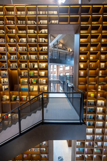 istock A modern library with rows of wooden bookshelves indoors 2181319084