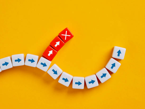 istock Choosing different direction from the crowd of cubes with arrows 2181319144