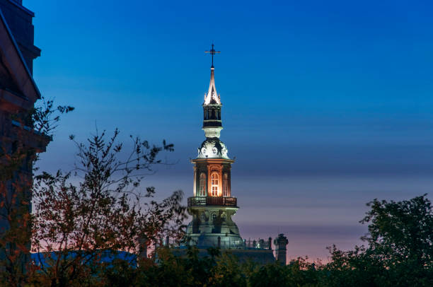 the historic landmark notre dame cathedral de Quebec canada illuminated at night.