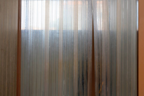 istock A window with a PVC curtain that is partially open for food control room. 2181336196