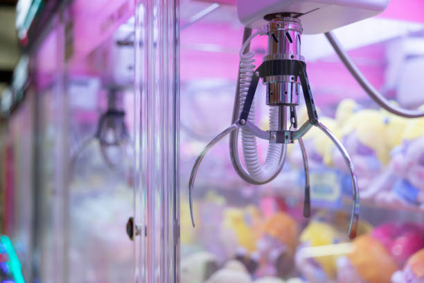 istock A claw machine with a bunch of stuffed animals inside 2181336211