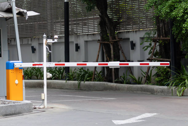 istock A red and white traffic barrier with a yellow box on the left. 2181336458