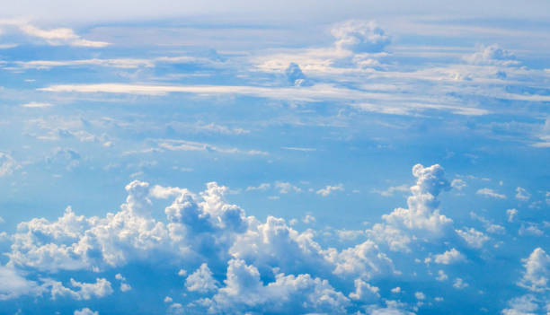 Tropical summer blue sky fluffy white cloud summertime on light sunny day cloudscape. Clear bright blue skyline spring sunlight climate background. Heaven blue environment ecology high scenic nature.