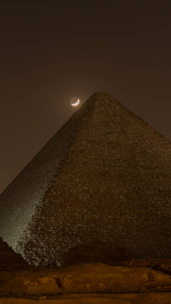 istock Giza Pyramid Under the Night Sky with Moon 2181341908