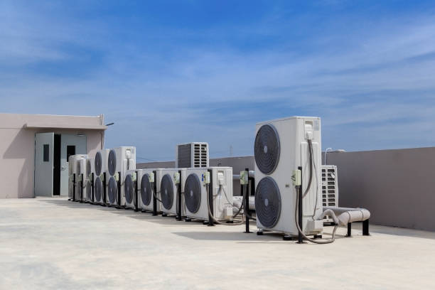 istock Air conditioning outdoor unit compressor install outside the building. 2181345130