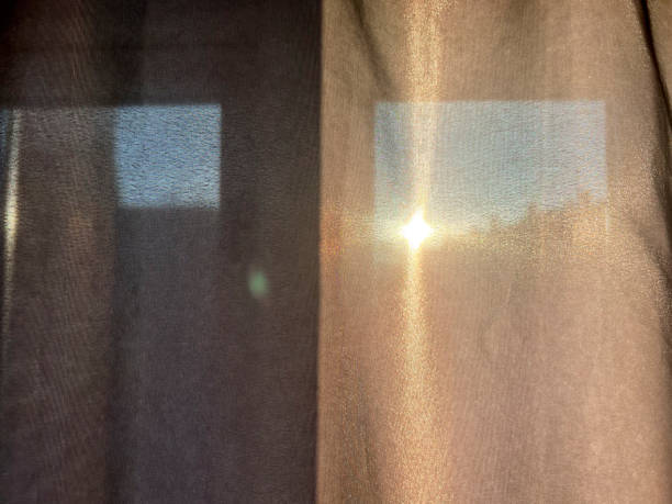 istock Sunrise behind shower curtain 2181346385