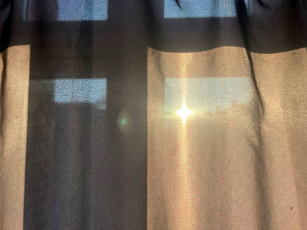 istock Sunrise behind shower curtain 2181346387