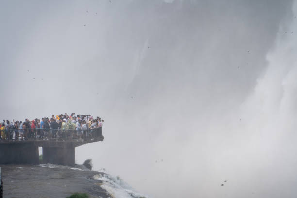 istock Famous balcony overlooking the Devil's Throat at Iguazu Falls 2181350602