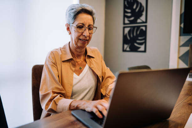 istock Woman using laptop in an office 2181352975