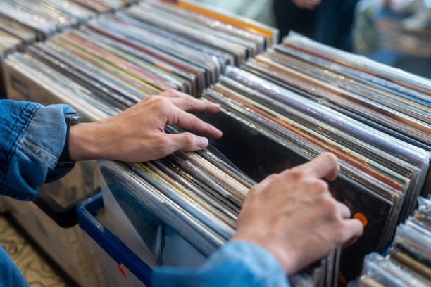istock Young Asian Man shopping for vinyl records 2181361274