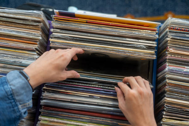 istock Young Asian Man shopping for vinyl records 2181361276