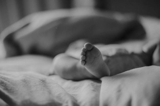 istock Baby hand and feet 2181361659