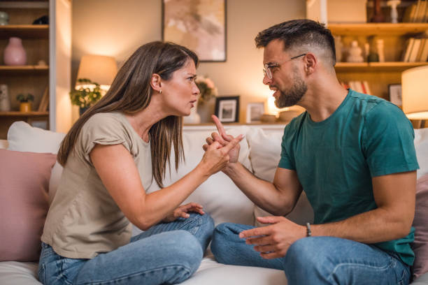 istock A boyfriend and a girlfriend in a serious argument at home 2181363062