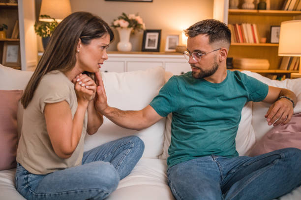 istock Woman expressing empathy and compassion to her sad frustrated husband 2181364894