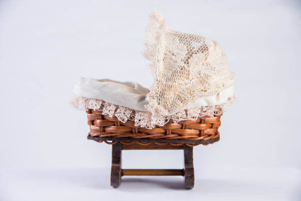 istock Wicker basket with a knitted woolen hat on a white background 2181371391