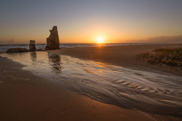 istock A sunset on Torre Del Loro beach, Mazagon, Huelva, Spain 2181374105