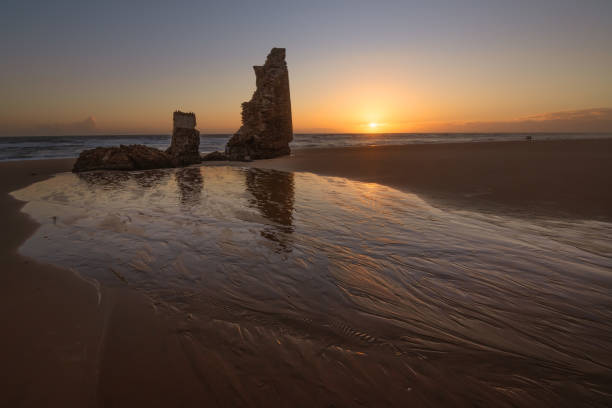 istock A sunset on Torre Del Loro beach, Mazagon, Huelva, Spain 2181374108