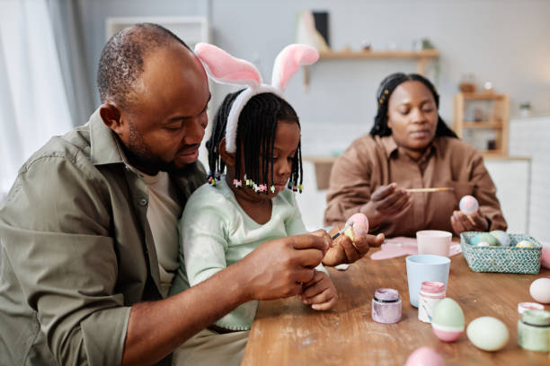 istock Decorating Easter Eggs with Family at Home 2181377855