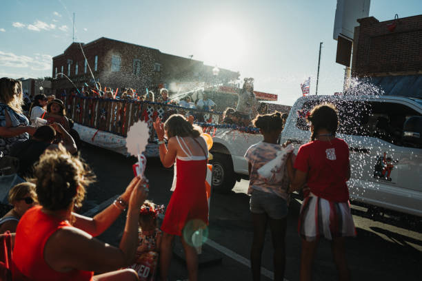 Williams, Arizona, USA,  July 4, 2024: Parade on the streets for the 4th of July Independence Day on the Route 66 in Williams, Arizona. People enjoy the parade with characters marching on the town main road