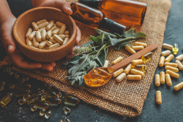istock Natural organic vitamins in hands close-up 2181380832