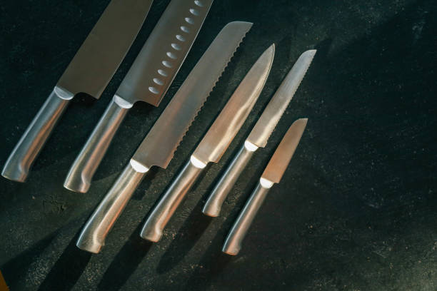 istock Casting steel various chef knife, Set of modern sharp kitchen knives on dark background 2181380952