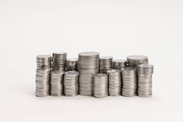 Pile of coins isolated on a white background. Banking and money.