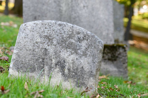 istock Very old small grave marker closeup. 2181395780
