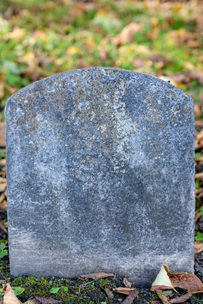 istock Very old grave marker closeup. 2181395784