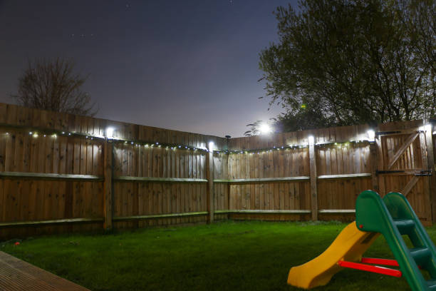 LEDs lighting up the back yard to create a magical, warm effect