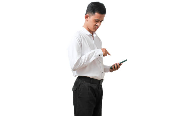istock office worker holding a cellphone wants to press the cellphone screen 2181400723