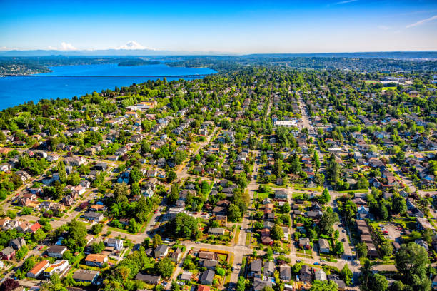 Suburban Seattle Neighborhood Aerial The Seattle area suburban communities of Madison Park, Washington Park, Harrison, Medrona, Leschi, and the Central District along Lake Washington just east of downtown Seattle shot via helicopter from an altitude of about 1000 feet. pacific northwest region stock pictures, royalty-free photos & images