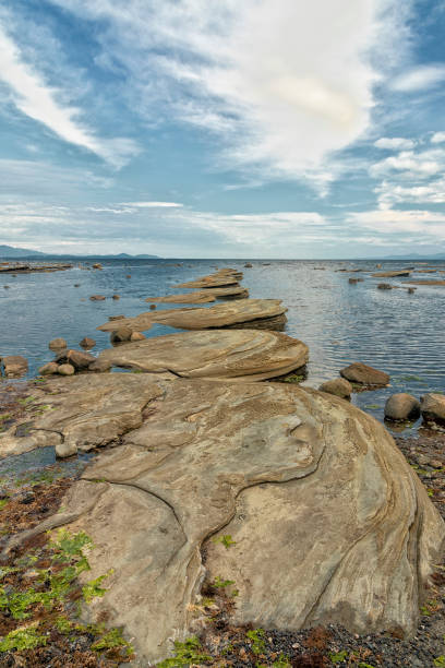 istock Beach rock formation and sky, Sandpiper Beach 2181411681