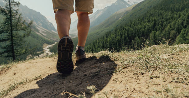 istock Mens footstep in the mountains 2181414565