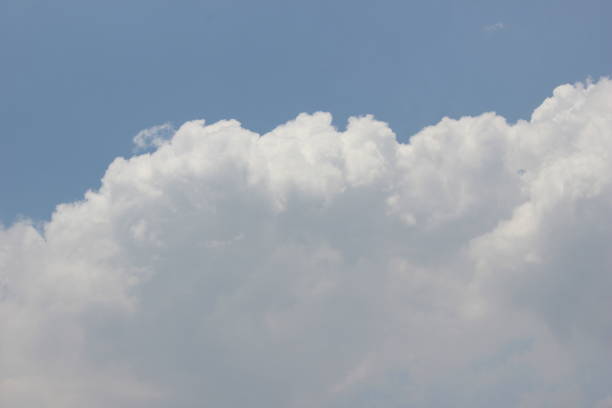 close up texture of white clouds in the blue sky