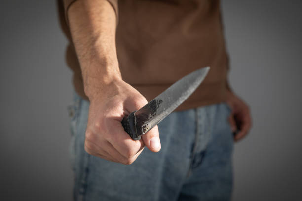 istock Caucasian man holding knife. 2181425731